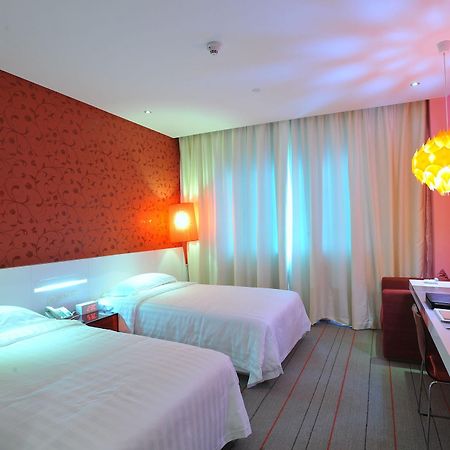 Otique Aqua Hotel شينزين المظهر الخارجي الصورة